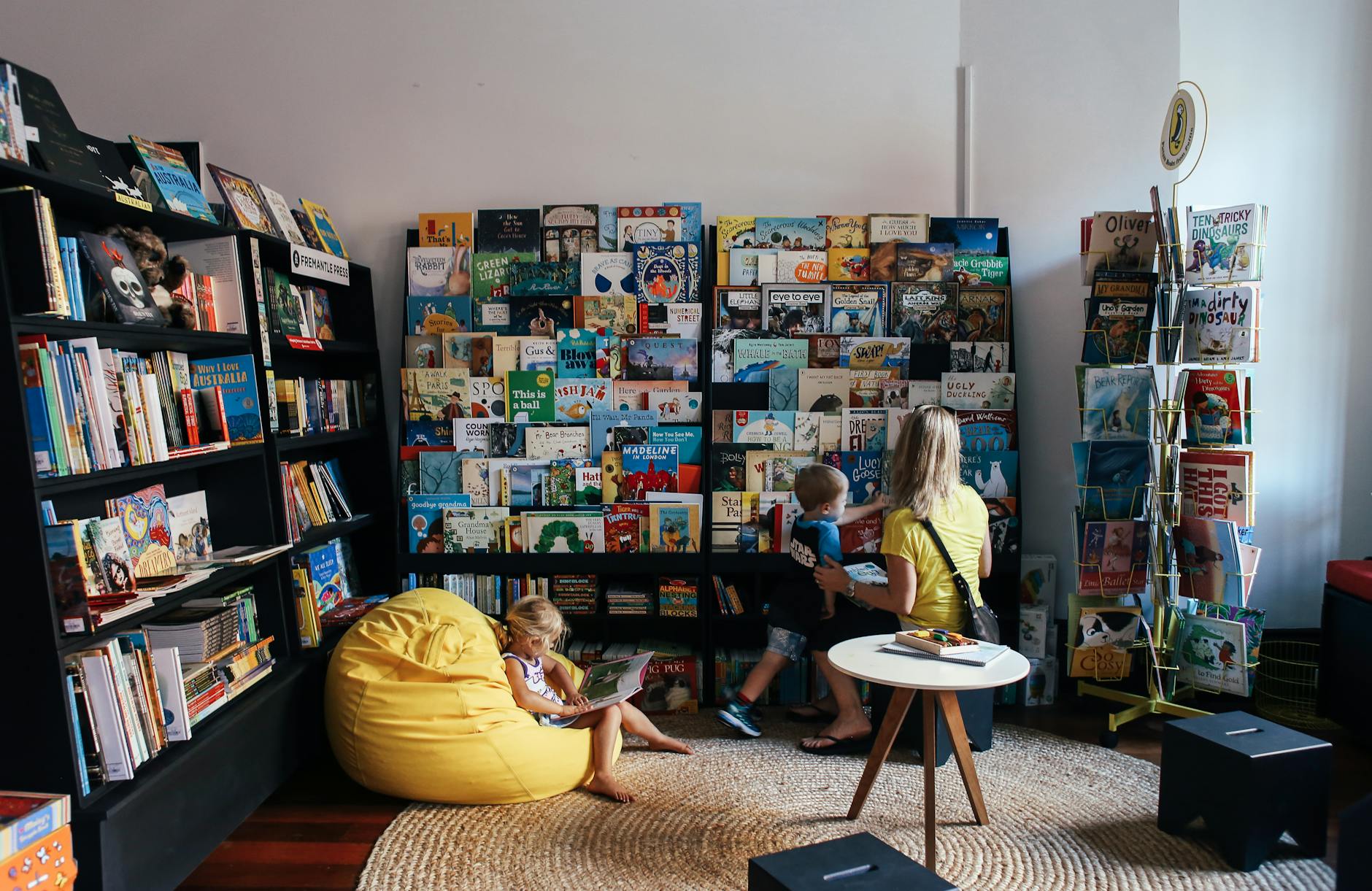 mother and children in library